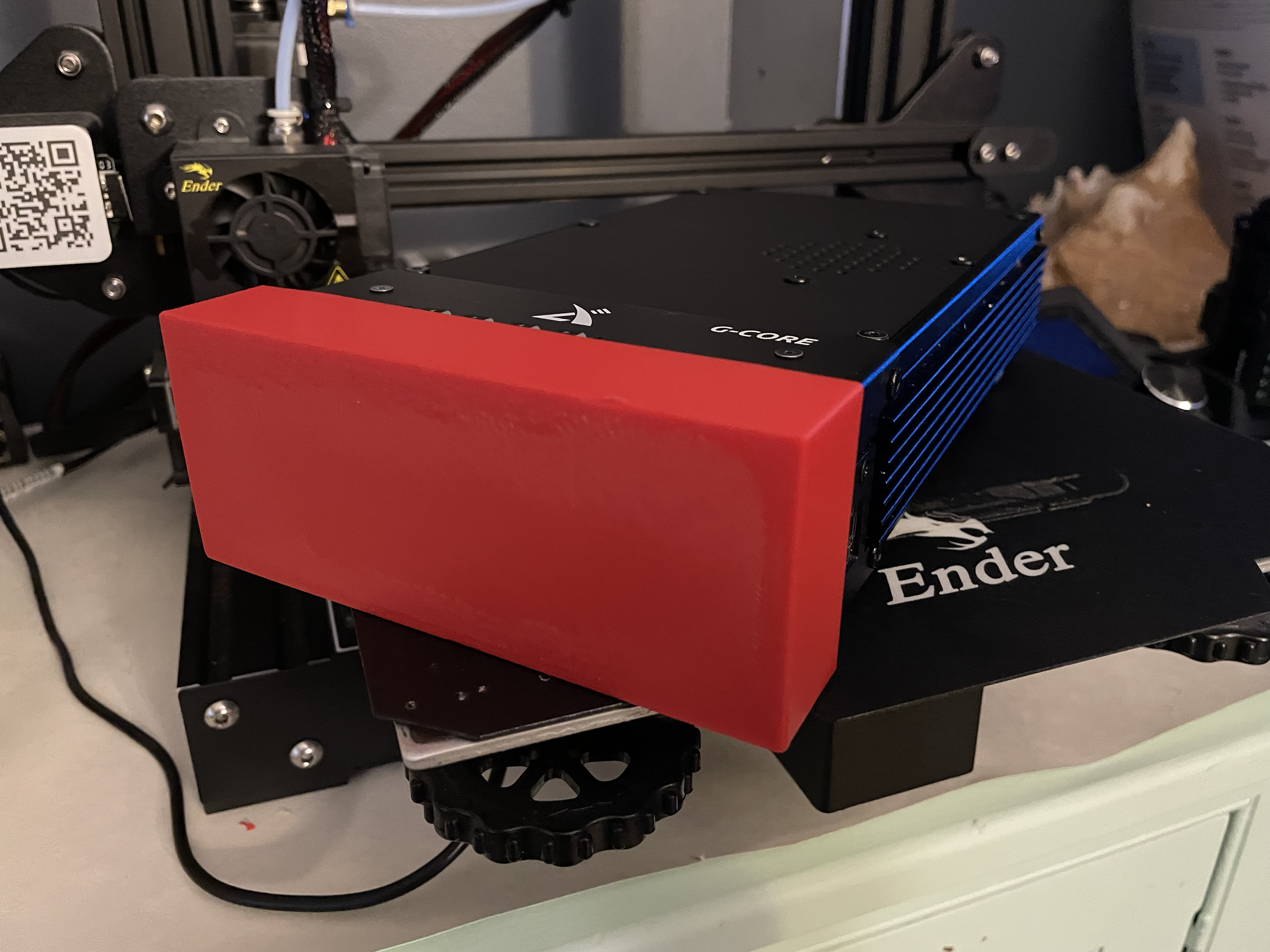 A completed cover printed in red covering a Xiegu 90.